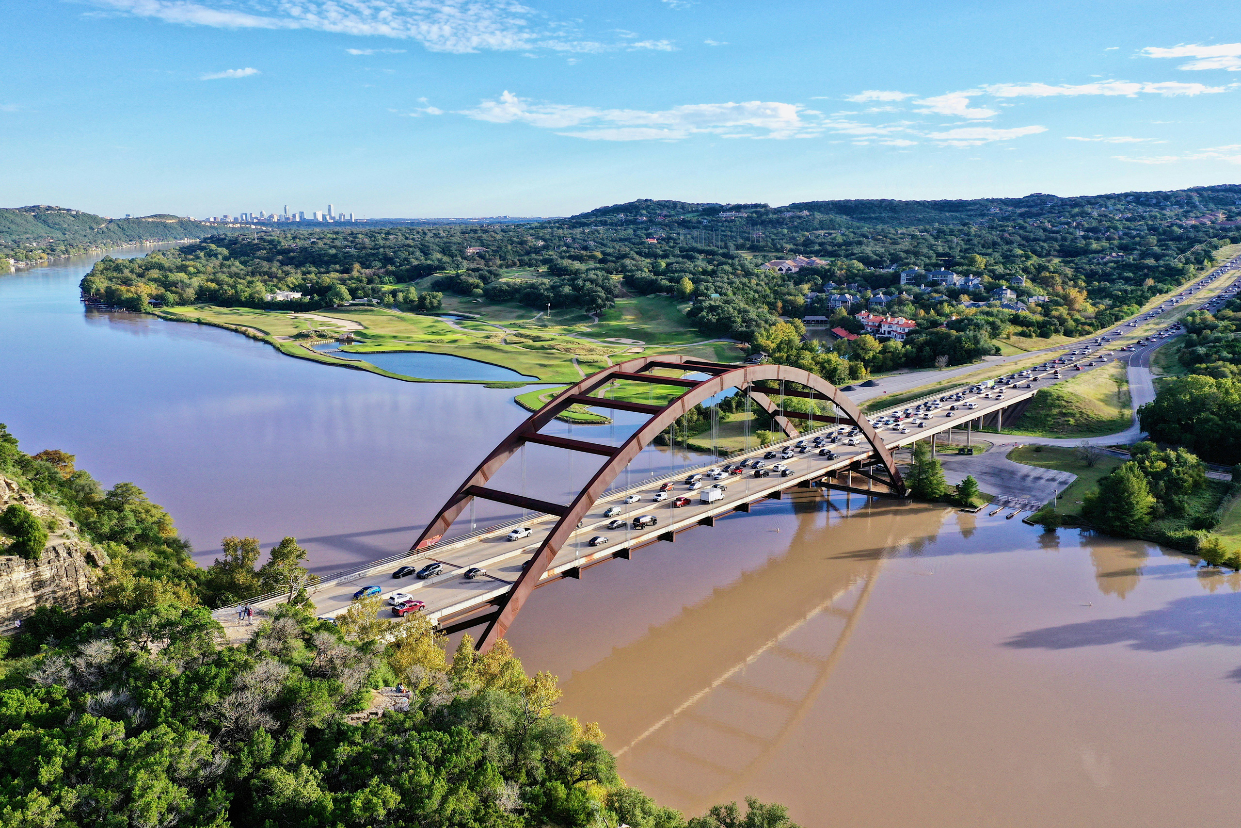 Pennybacker bridge with a view of the Austin skyline.